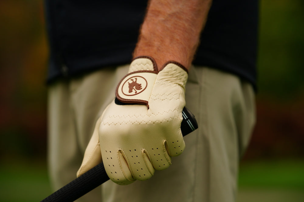man wearing The Tawny golf glove