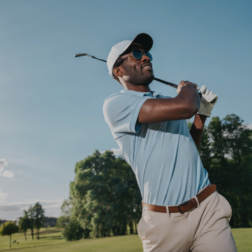 happy man playing golf