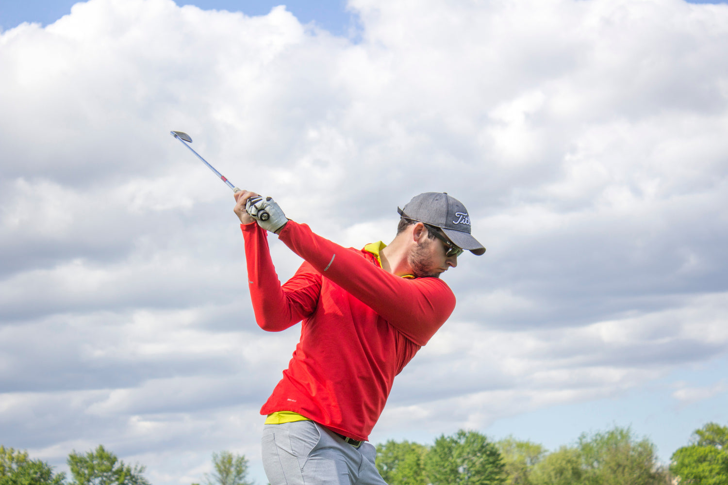 Golfer about to swing his club