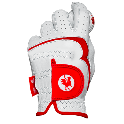 The Range Rooster golf glove holding golf ball