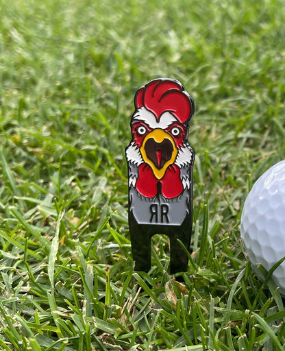 The Rowdy Rooster - Divot Tool in a ground