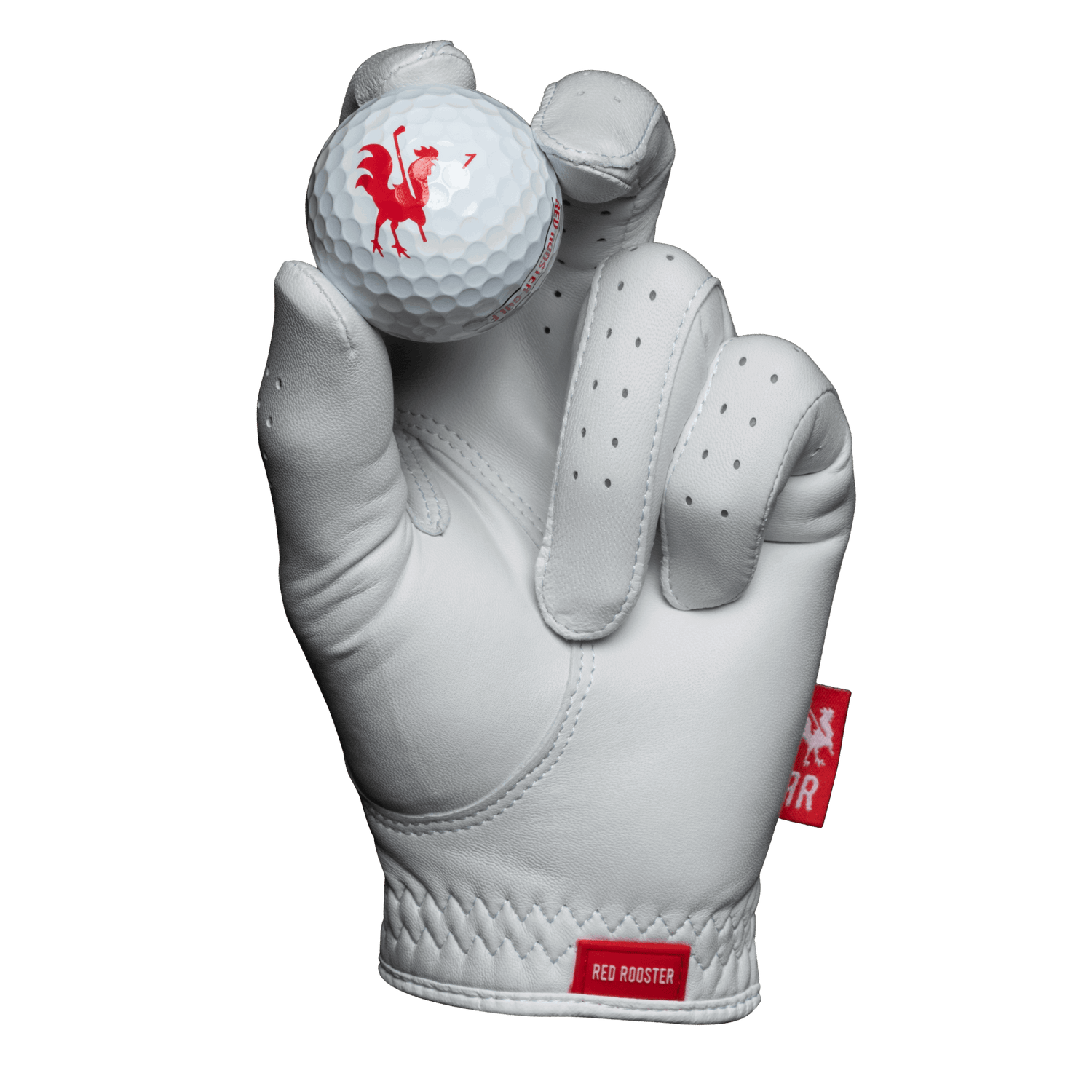 The Feather golf glove holding golf ball