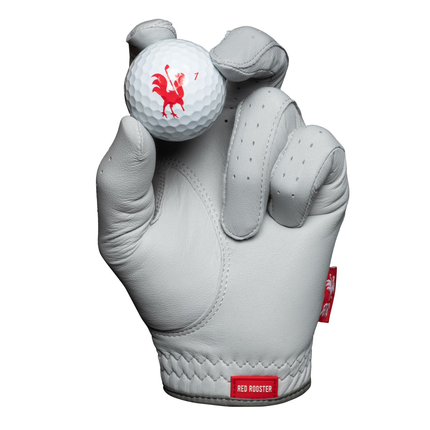 The Scots Silver golf glove holding golf ball
