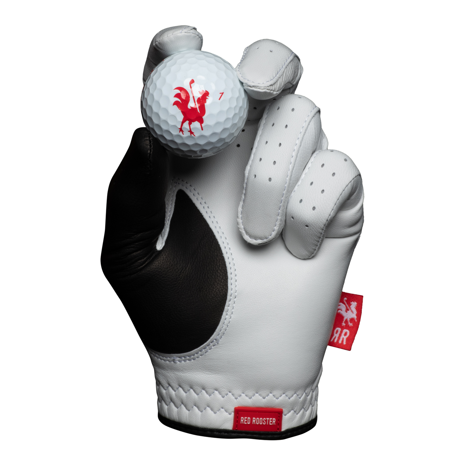 The Wing golf glove holding golf ball