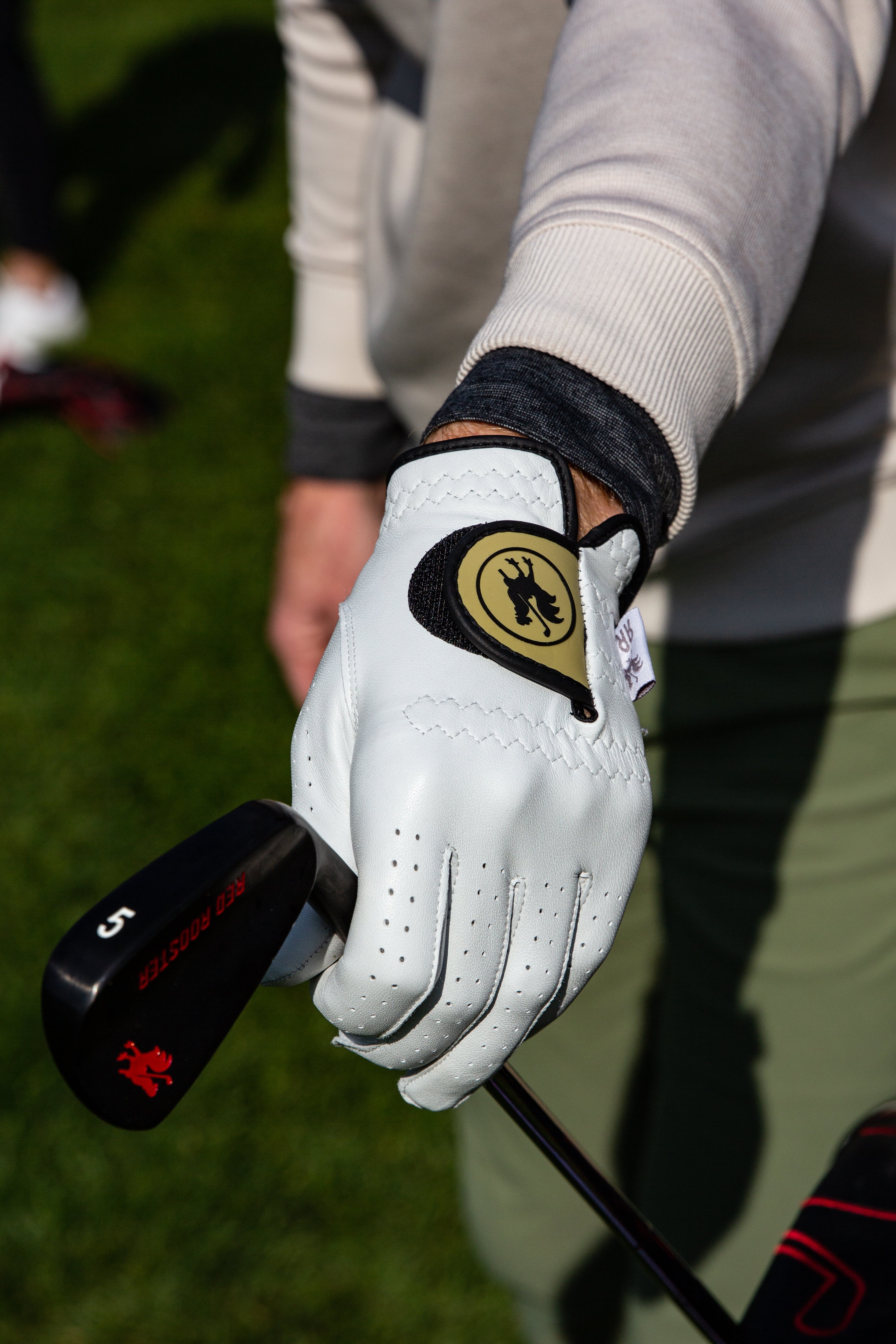 man wearing The Boilermaker golf glove in left hand