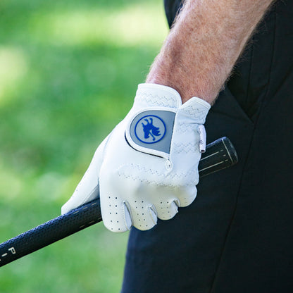 man wearing The Over Easy golf glove in left hand
