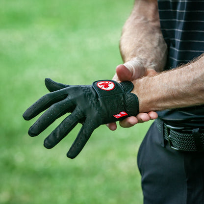 man wearing The Saddle golf glove