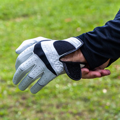 man wearing The Cape golf glove in left hand